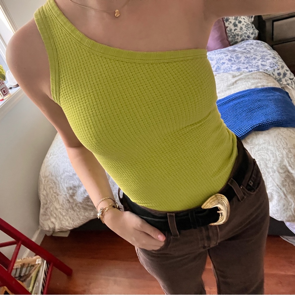Asymmetrical, one shoulder body suit